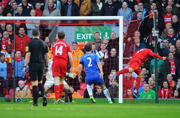 Luis Suarez of Liverpool scores the equalising goal during the Barclays Premier League match between Liverpool and Chelsea at Anfield on April 21, 2013 in Liverpool, England. (Photo by Michael Regan/Getty Images)